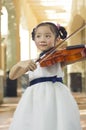 Girl playing violin Royalty Free Stock Photo