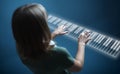 Girl playing on virtual piano keyboard Royalty Free Stock Photo