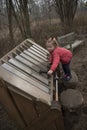 Girl playing a xylophone in a garden Royalty Free Stock Photo