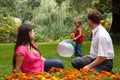 Girl plays with big inflatable ball in park Royalty Free Stock Photo