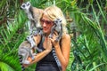 Woman plays with lemurs Royalty Free Stock Photo