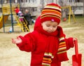 The girl plays sand