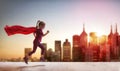 Girl plays superhero Royalty Free Stock Photo