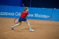 Girl plays tennis on the field