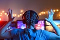 A girl plays video games at a computer. on the background of three monitors. Creative light Royalty Free Stock Photo