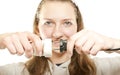 Girl plugging (unplugging) wires Royalty Free Stock Photo