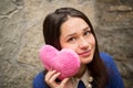 Girl with plush pink heart