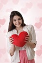 Girl with plush red heart Royalty Free Stock Photo