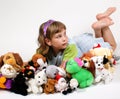 girl and plushy toys Royalty Free Stock Photo