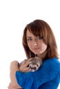 Girl and polecat Royalty Free Stock Photo