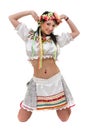 Girl in polish national traditional costume posing, full length portrait against isolated white