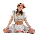 Girl in polish national traditional costume posing, full length portrait against isolated white