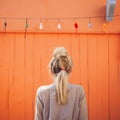 Girl With Ponytail Against Painted Wall: Kitsch Charm And Bold Contrast