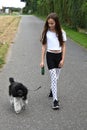 Girl and poodle dog Royalty Free Stock Photo