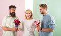 Girl popular receive lot men attention. Woman smiling can not choose partner, grabs both bouquets. Girl happy likes Royalty Free Stock Photo