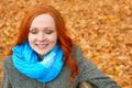 Girl portrait with closed eyes on yellow fallen leaves background, face closeup, autumn season Royalty Free Stock Photo