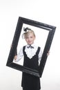 Girl posing in antique frame Royalty Free Stock Photo