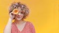 Girl Posing With An Orange Gerbera Daisy Flower Covering Her Eye With Daisy Royalty Free Stock Photo