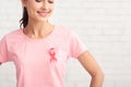 Girl Posing In T-Shirt With Cancer Ribbon On White Background Royalty Free Stock Photo