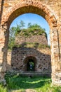 Girl posing in technical ruin. Iron Smelting Plant called Frantiskova Huta in Slovakia