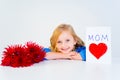 Girl with a postcard for mom Royalty Free Stock Photo