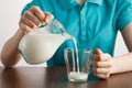 Girl pouring healthy lifestyle milk food