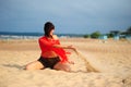 The girl pouring out sand Royalty Free Stock Photo