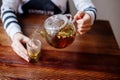 Pouring Herbal Tea. Royalty Free Stock Photo