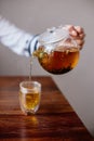 Pouring Herbal Tea. Autumn concept. Royalty Free Stock Photo