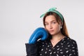 Girl power concept. Confident young woman isolated on gray wall background. Feminine and independent strength.Girl in boxing Royalty Free Stock Photo