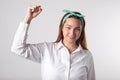 Girl power concept. Young woman showing her arm for feminine and independent strength Royalty Free Stock Photo