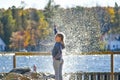 Girl Power, Girl Standing in front of Splashing Wave