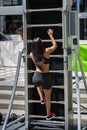 Girl Practicing Fitness Climbing a New Machine: Mobile Escalator for Sport