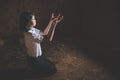 The girl prayed to God, open palm up worship., Concept for Christian, Christianity, Catholic religion, divine, heavenly, celestial Royalty Free Stock Photo