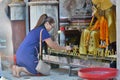 Girl praying at temple. Wat Phra That Doi Suthep. Chiang Mai. Thailand