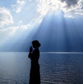 Girl praying to the God Royalty Free Stock Photo