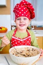 Girl preparing granola