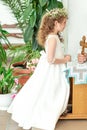 Girl preparing to take first communion. First Communion Day in the church