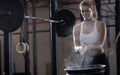 Girl preparing to weightlifting Royalty Free Stock Photo