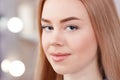 Girl after procedure of permanent makeup of eyebrows. Royalty Free Stock Photo