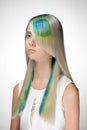 Girl with professional hair colouring and creative make up in peacock style Royalty Free Stock Photo