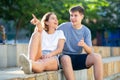 Girl prompts the boy, pointing with his hand at something Royalty Free Stock Photo