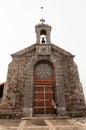 Girl pull the rope of the church bell Royalty Free Stock Photo