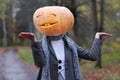 Girl with pumpkin head Royalty Free Stock Photo