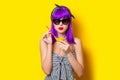 Girl with purple hair holding lemonade cocktail Royalty Free Stock Photo