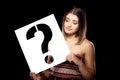 Girl with a question mark sign Royalty Free Stock Photo