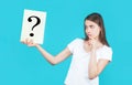 Girl question. Woman with doubtful expression and question marks. Thinking woman. Getting answers, thinking. Question Royalty Free Stock Photo