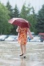 Girl, rain, weather, natural disaster, rain, child , umbrella, water, kid Royalty Free Stock Photo