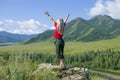 The girl with the raised hands in Mountains Altai Russia the top view Royalty Free Stock Photo