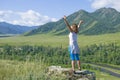 The girl with the raised hands in Mountains Altai Russia the top view Royalty Free Stock Photo